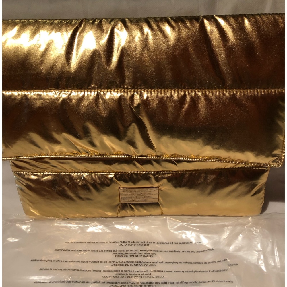 NWT Carolina Herrera gold puffer clutch w/ 10 FREE surprise beauty samples